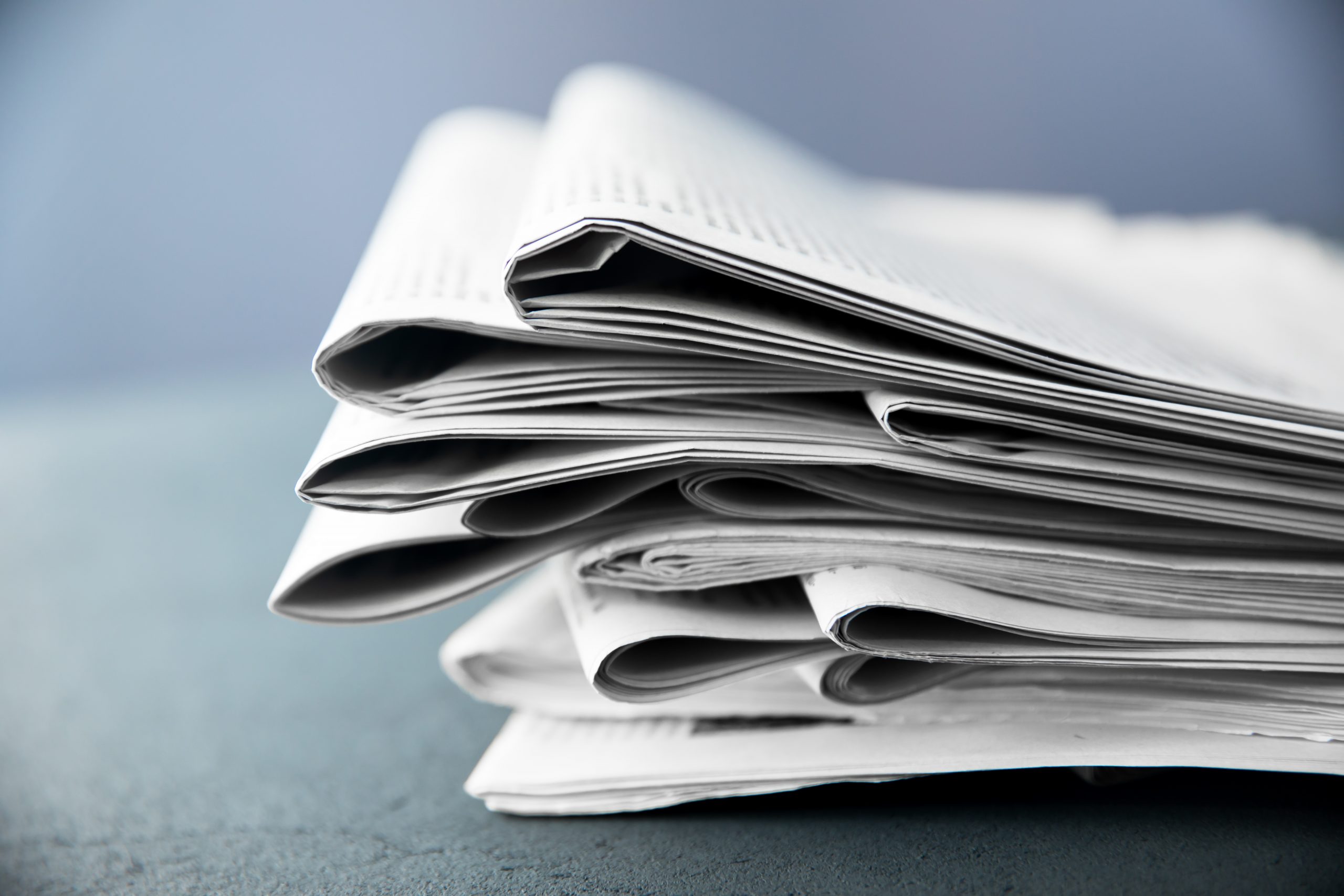 tack of newspapers
